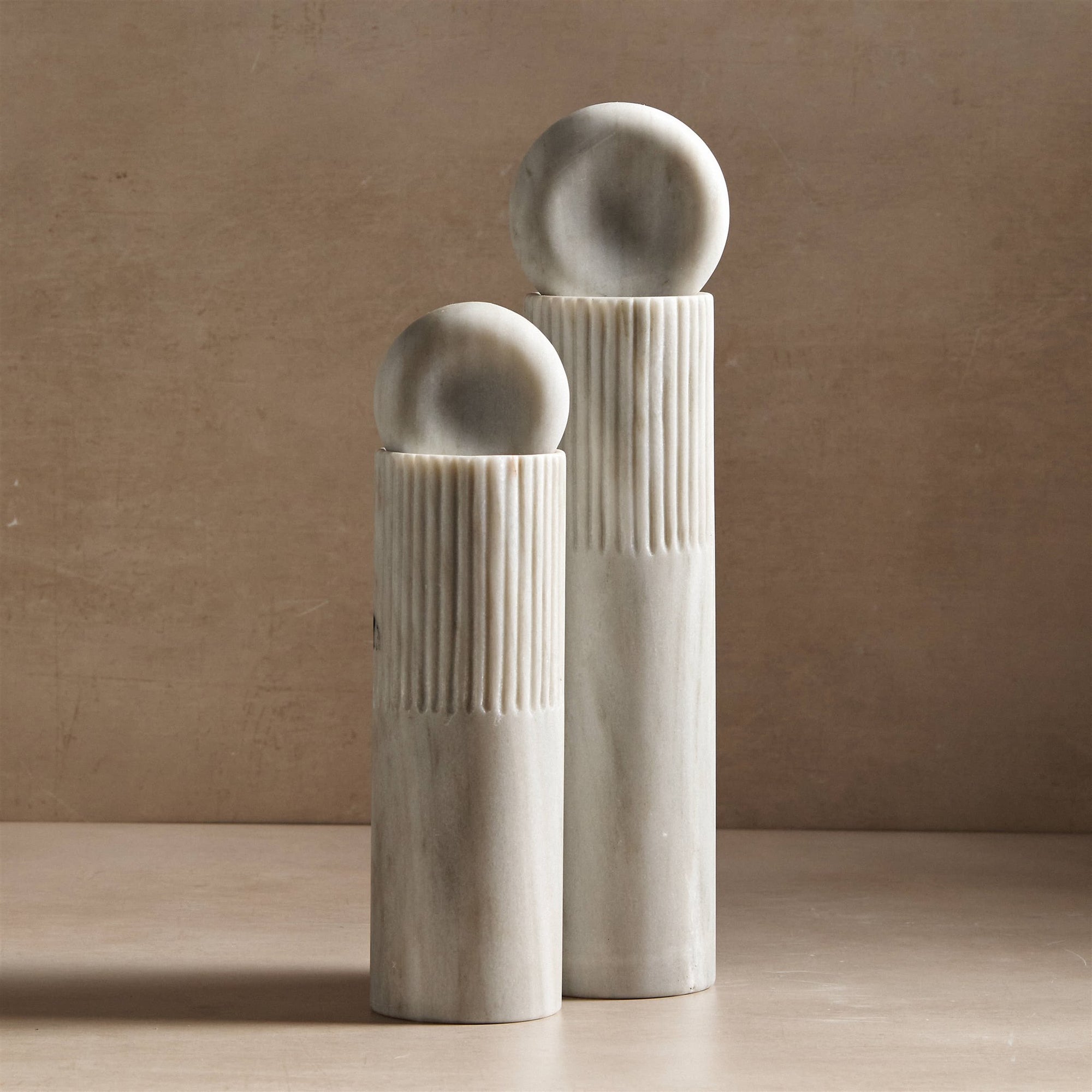 pair of totem sculpture made of white marble for decor