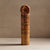 Atlas totem sculpture made from travertine stone for decor