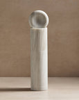 large totem sculpture made of white marble for decor