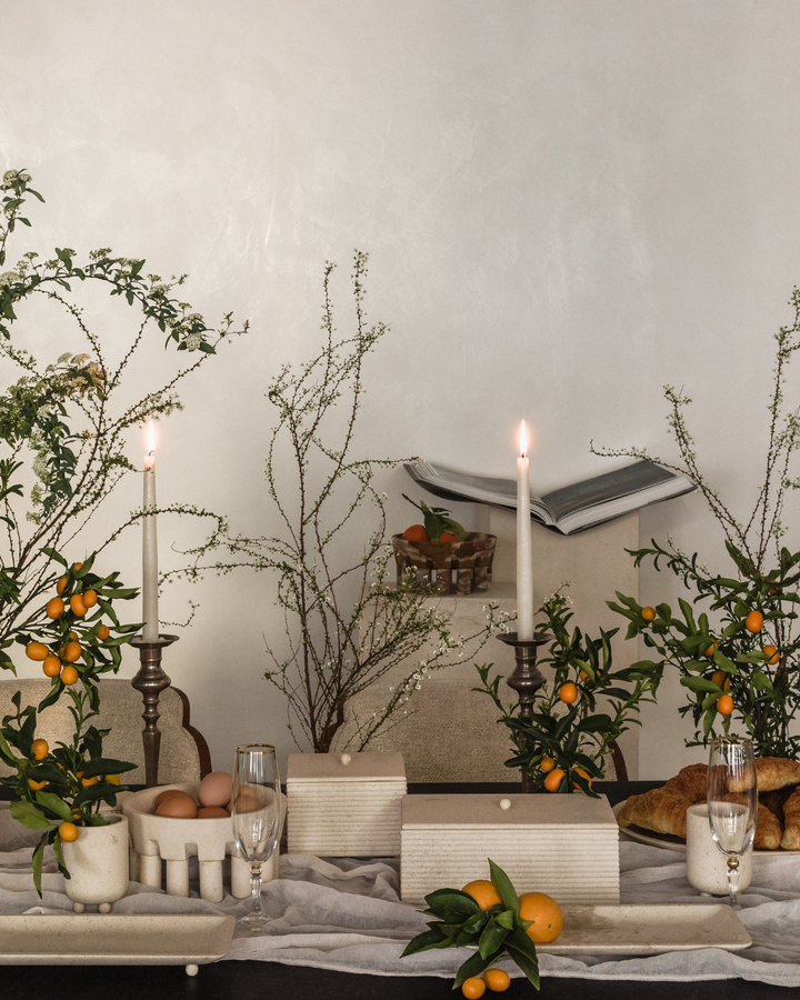 Spring table setting with limestone accessories