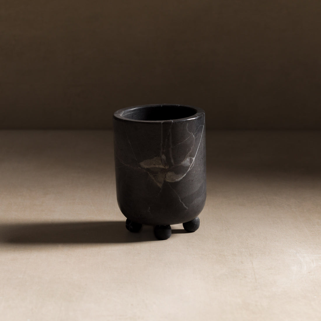 Small vessel made of black marble for home decor