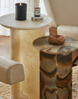 Stone side nesting tables made from green onyx and ivory onyx
