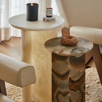 Stone side nesting tables made from green onyx and ivory onyx