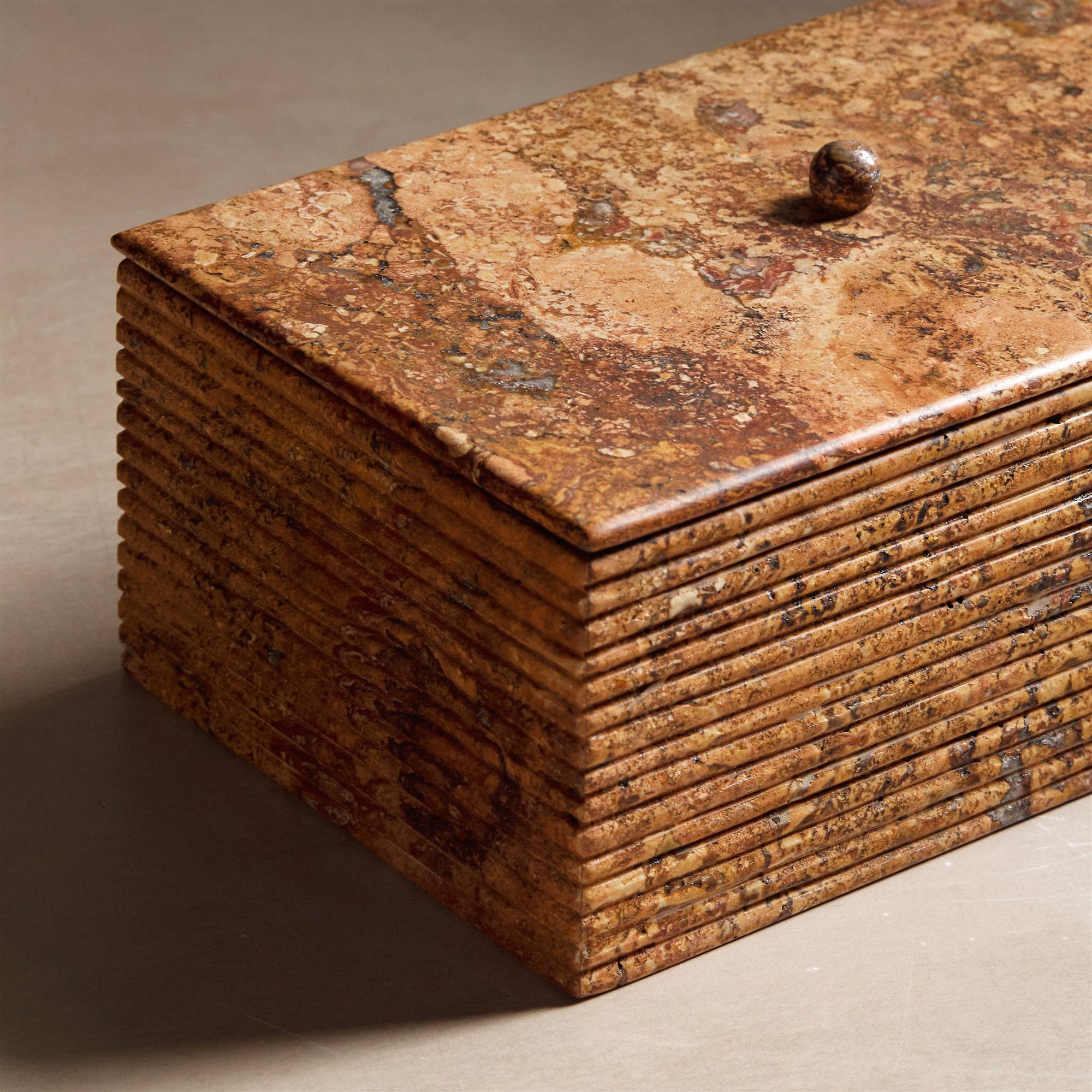 stone travertine box with ribbing detail close up