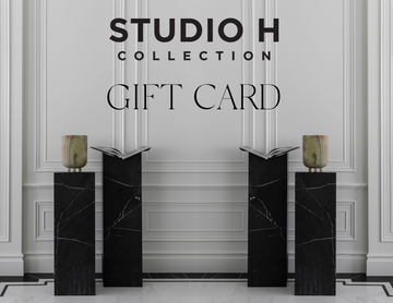 Studio H collection gift card with pedestals and vase on it