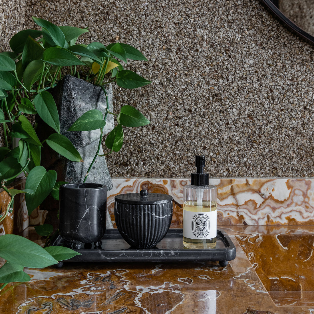 Bathroom accessories made from black marble