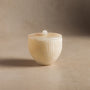 Small container for bathroom or kitchen made of ivory onyx