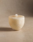 Small container for bathroom or kitchen made of ivory onyx