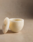 Small container for bathroom or kitchen made of ivory onyx