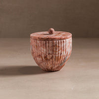 Small container for bathroom or kitchen made from pink marble