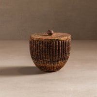 Small container with lid for bathroom or kitchen made from travertine