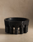 Pomona bowl made from black marble for holding fruit in a kitchen or decorative objects