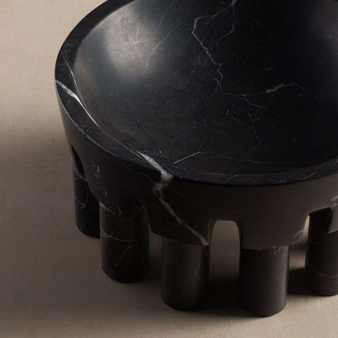 Pomona bowl made from black marble for holding fruit in a kitchen or decorative objects